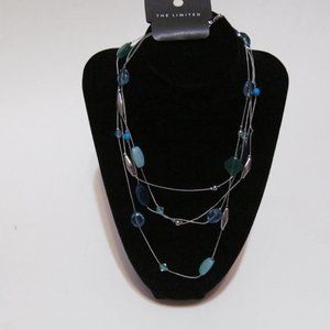 Silver tone and assorted Lucite blue beads